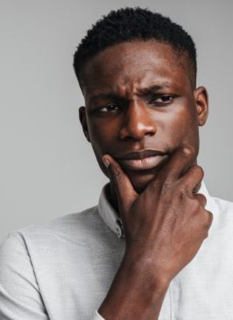 Young black man thinking